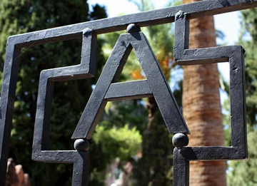 Letter "A" on iron fence